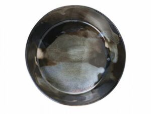 a brown and black plate on a white background