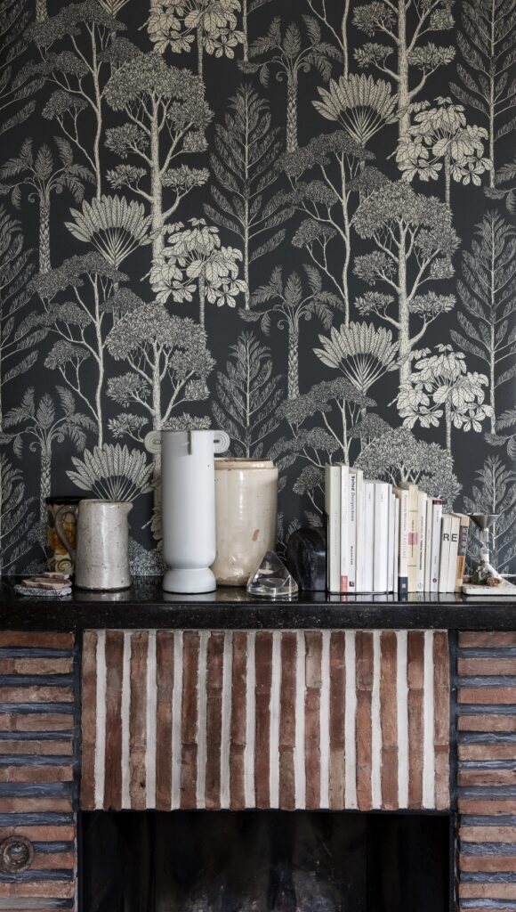 a fireplace with a wallpaper and a fire place