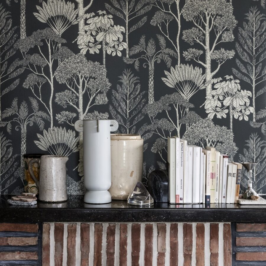 a fireplace with a wallpaper and a fire place