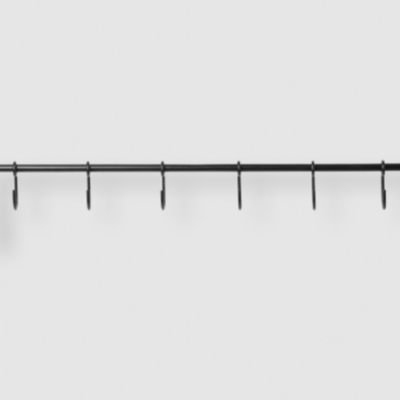 Black metal kitchen rail with hooks for hanging utensils