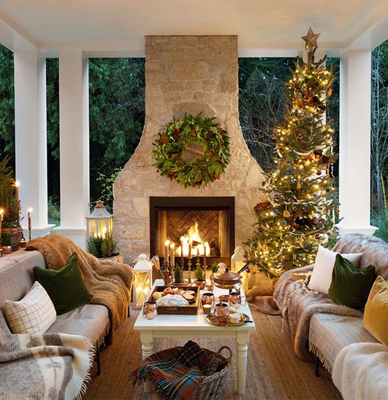 A living room filled with furniture and a fire place