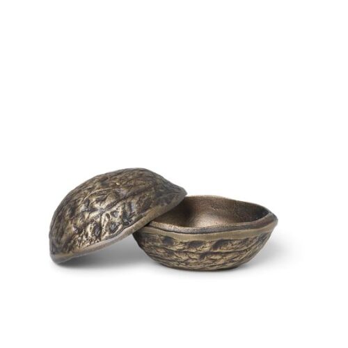 two metal bowls sitting on top of each other