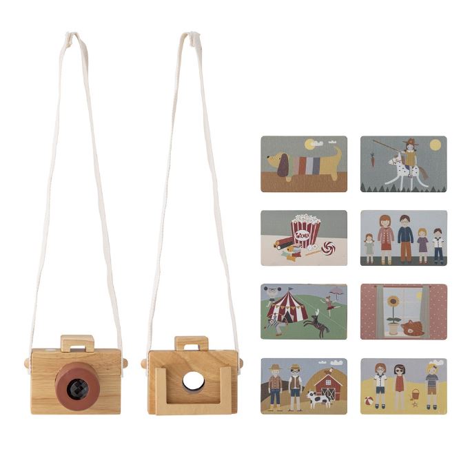 a wooden camera and some pictures on a white background