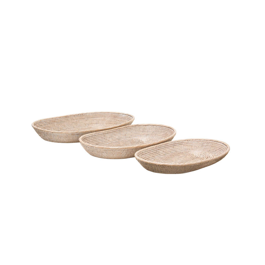 three woven bowls on a white background