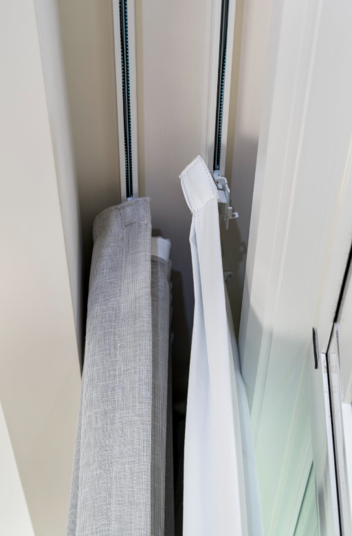 Custom-measured window coverings fitted to block Australian sunlight and improve insulation