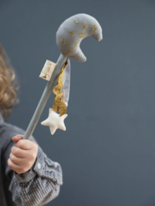 child wearing moon fairy tiara
