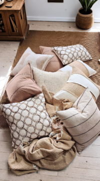 stonewashed cushion styled on sofa