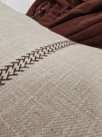 brown herringbone embroidery detail cushion