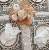 Decorative rectangular vinyl placemat styled on table