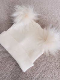 Cream baby beanie hat with fluffy pom pom top for newborns to 8 years